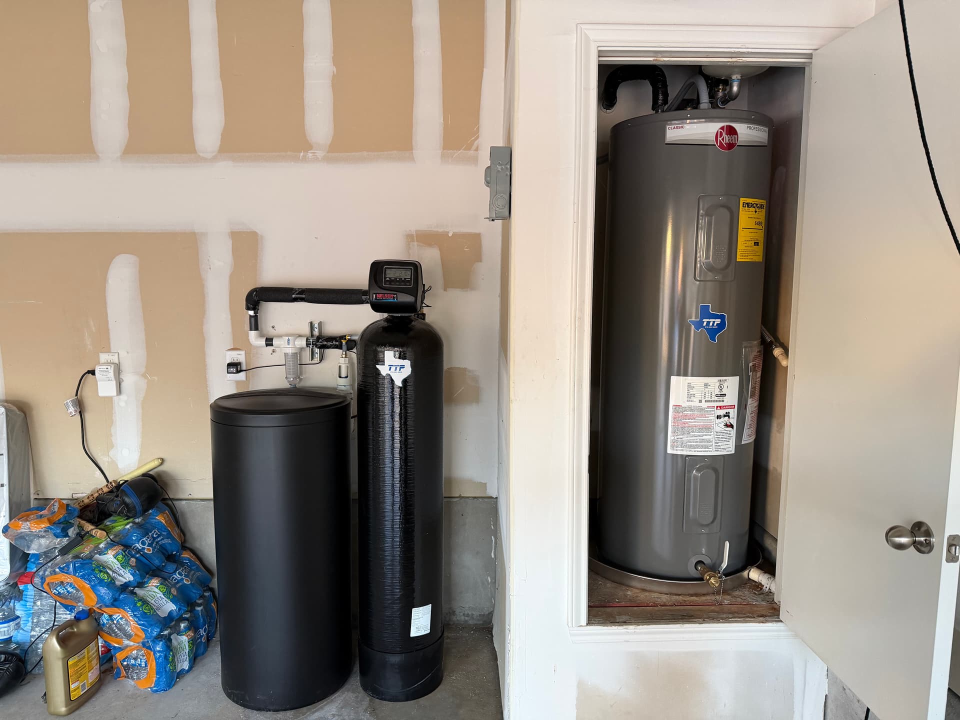 Enhancing Home Comfort with a Dual Media Water Softener and Water Heater Installation